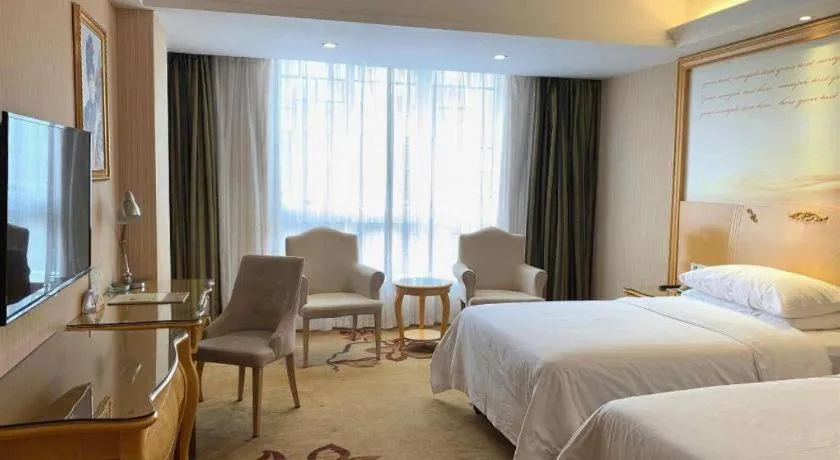 Bed in Vienna Hotel Guangxi Guilin Gongchengtianjie