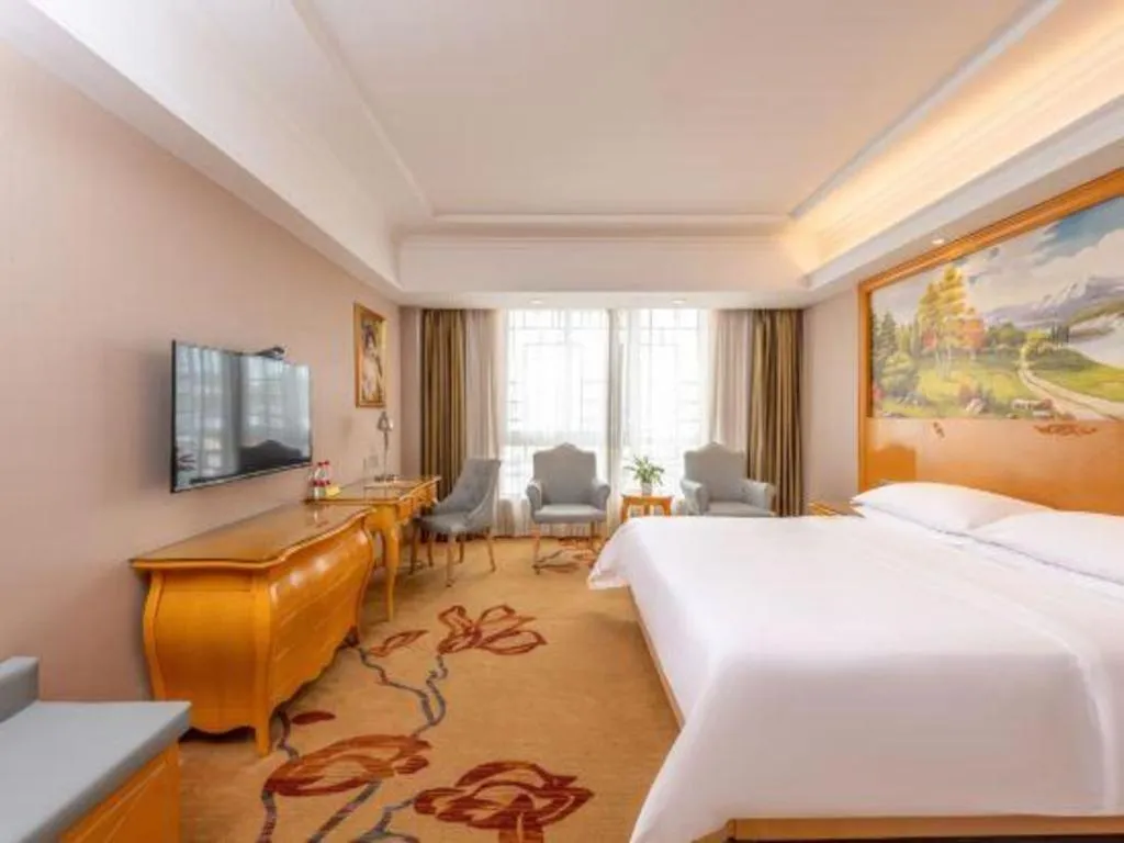 Bed in Vienna Hotel Guangxi Guilin Gongchengtianjie