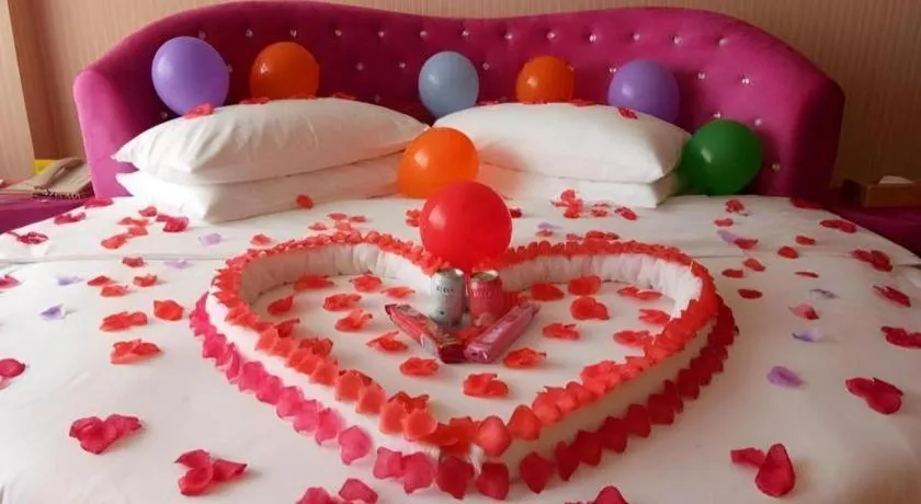 Bed in Vienna Hotel Guangxi Guilin Gongchengtianjie