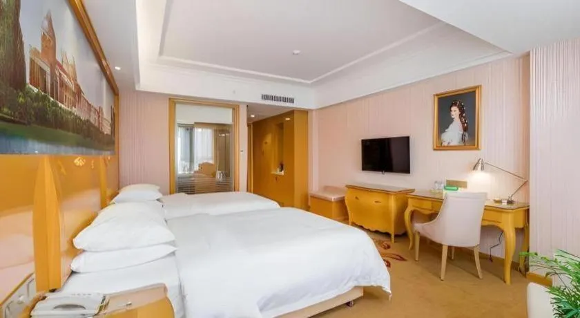 Bed in Vienna Hotel Guangxi Guilin Gongchengtianjie