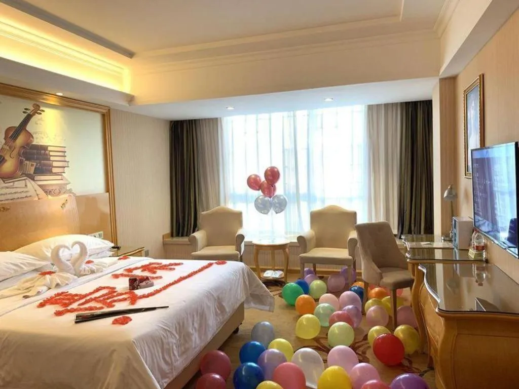 Bed in Vienna Hotel Guangxi Guilin Gongchengtianjie