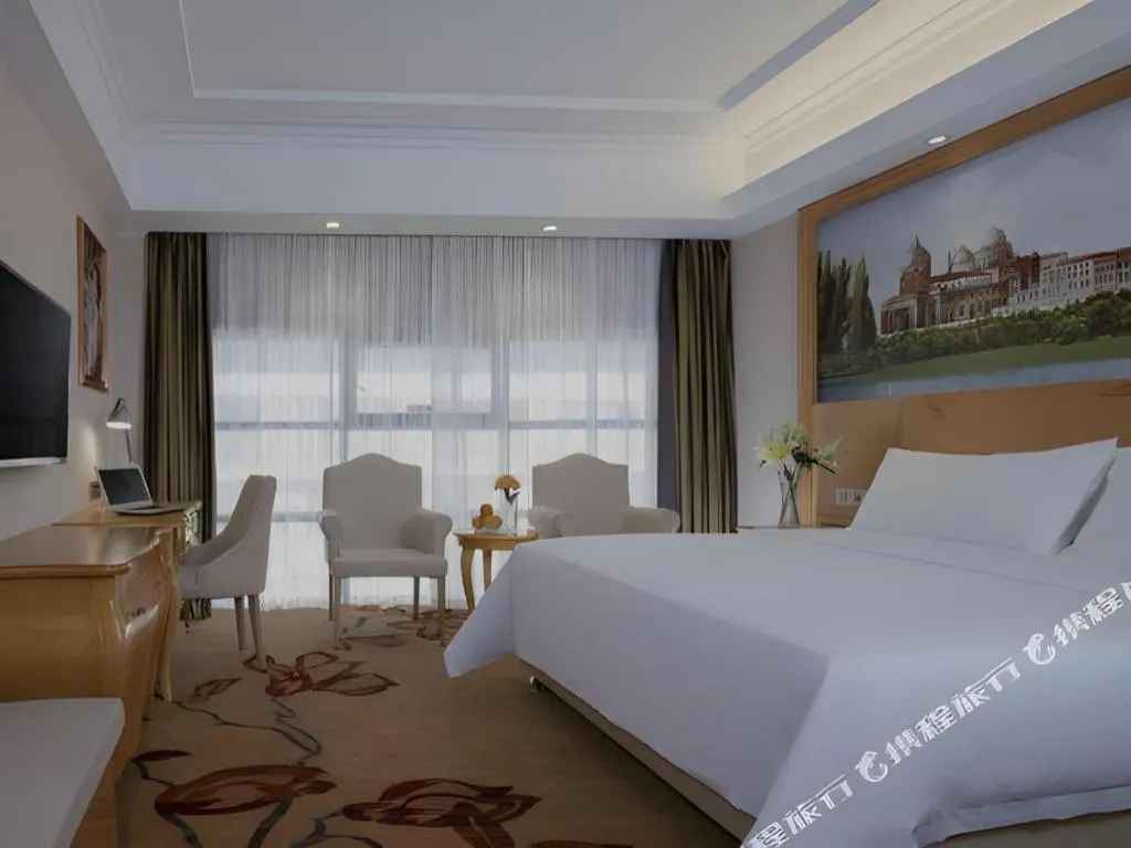 Bed in Vienna Hotel Guangxi Guilin Gongchengtianjie