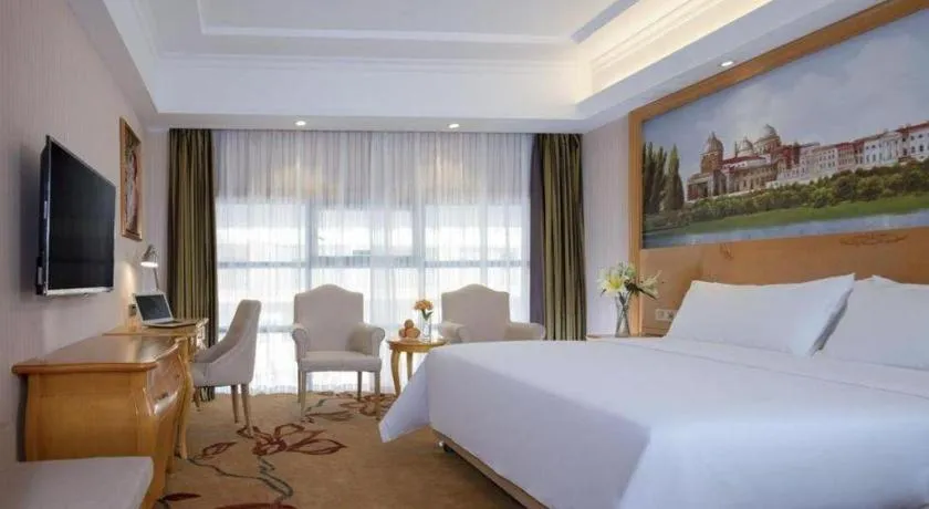 Bed in Vienna Hotel Guangxi Guilin Gongchengtianjie