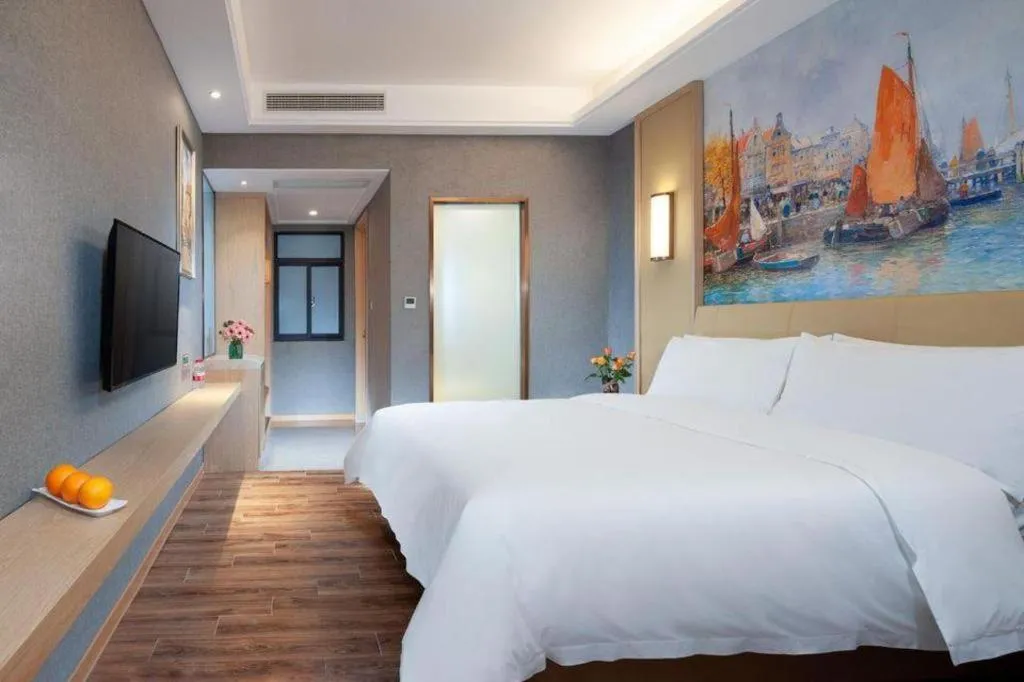 Bed in Vienna Hotel Jiangxi Ji'an Yanjingfu