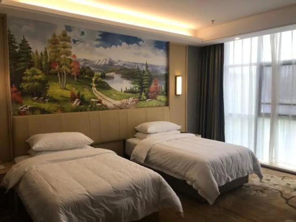 Bed in Vienna Hotel Jiangxi Ji'an Yanjingfu