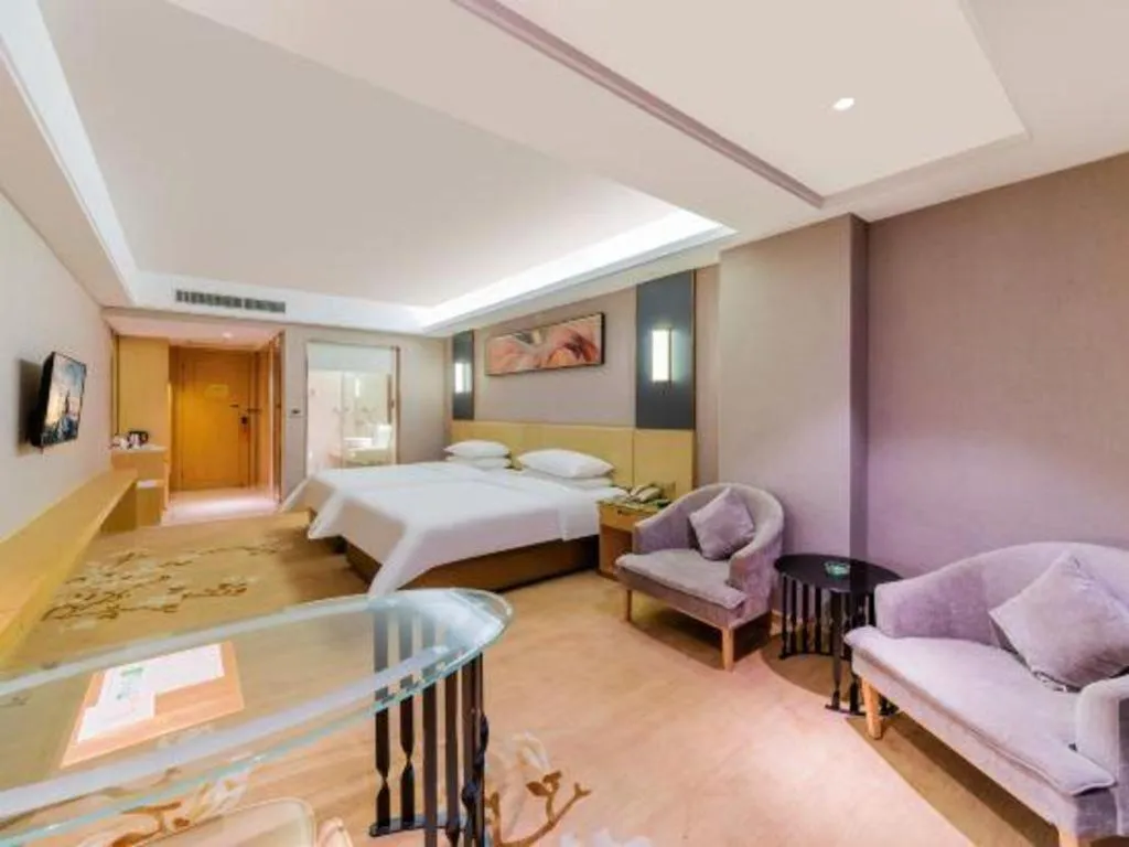 Bed in Vienna Hotel Guangdong Zhongshan Xiaolan High-Speed Railway Station