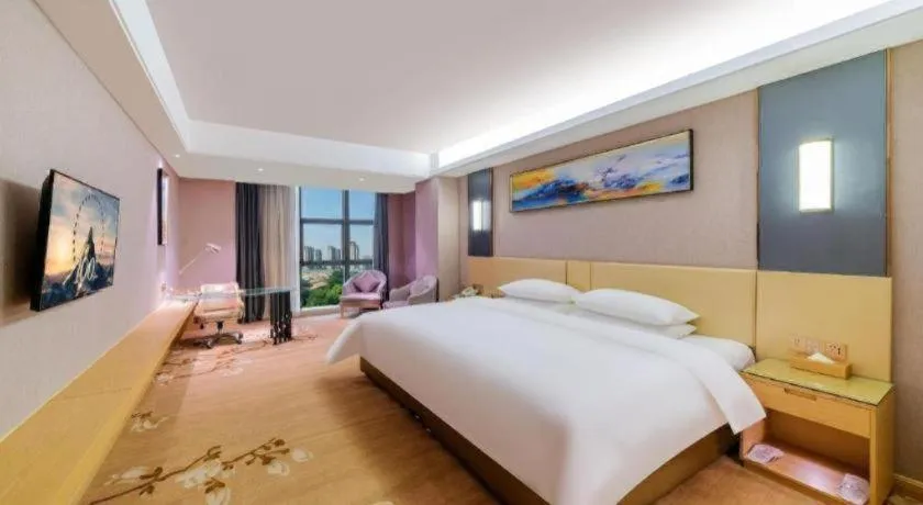 Bed in Vienna Hotel Guangdong Zhongshan Xiaolan High-Speed Railway Station