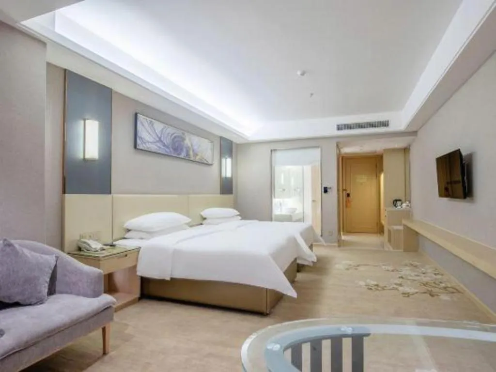 Bed in Vienna Hotel Guangdong Zhongshan Xiaolan High-Speed Railway Station