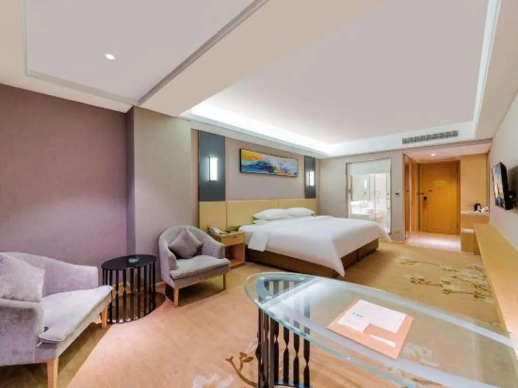 Bed in Vienna Hotel Guangdong Zhongshan Xiaolan High-Speed Railway Station