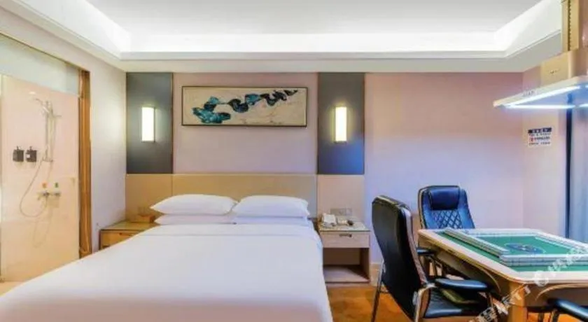 Bed in Vienna Hotel Guangdong Zhongshan Xiaolan High-Speed Railway Station