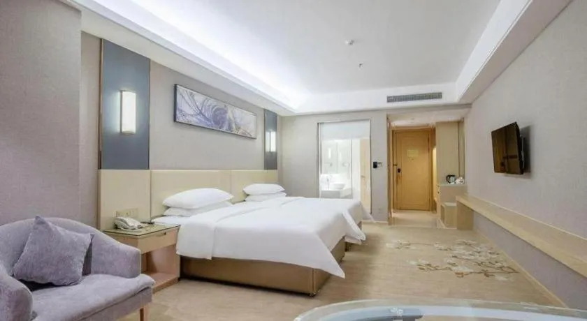 Bed in Vienna Hotel Guangdong Zhongshan Xiaolan High-Speed Railway Station