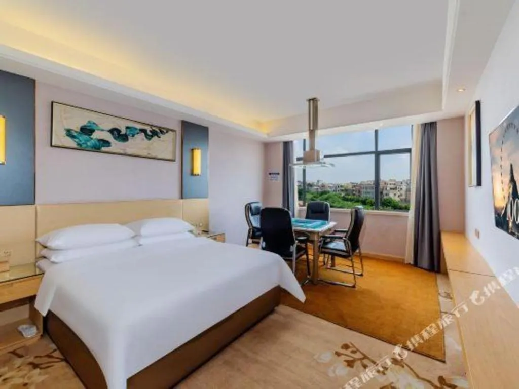 Bed in Vienna Hotel Guangdong Zhongshan Xiaolan High-Speed Railway Station