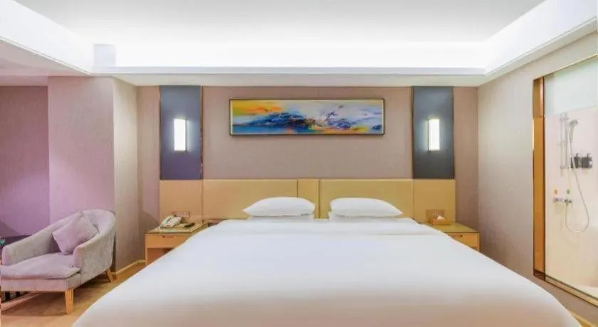 Bed in Vienna Hotel Guangdong Zhongshan Xiaolan High-Speed Railway Station