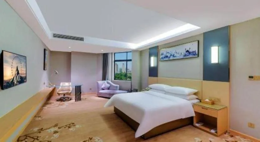 Bed in Vienna Hotel Guangdong Zhongshan Xiaolan High-Speed Railway Station