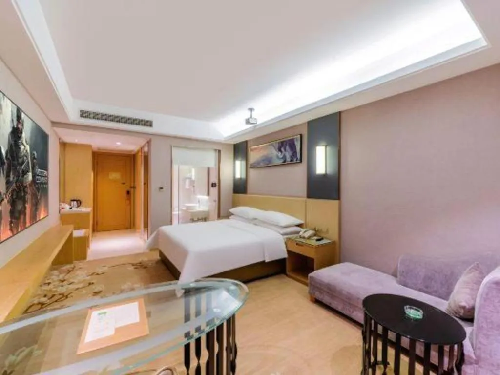 Bed in Vienna Hotel Guangdong Zhongshan Xiaolan High-Speed Railway Station