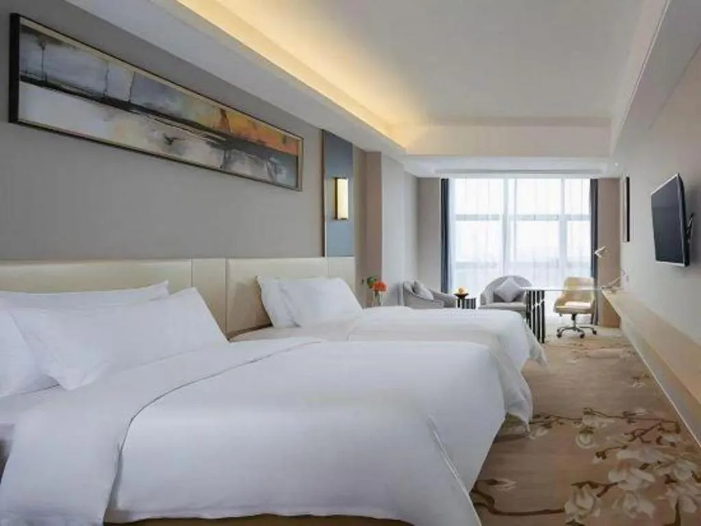 Bed in Vienna Hotel Guangdong Zhongshan Xiaolan High-Speed Railway Station