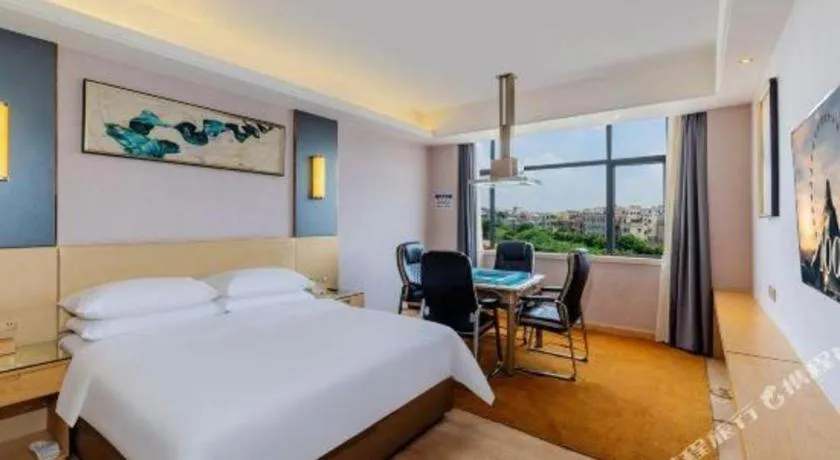 Bed in Vienna Hotel Guangdong Zhongshan Xiaolan High-Speed Railway Station