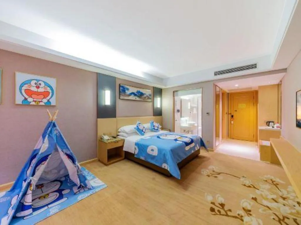 Bed in Vienna Hotel Guangdong Zhongshan Xiaolan High-Speed Railway Station