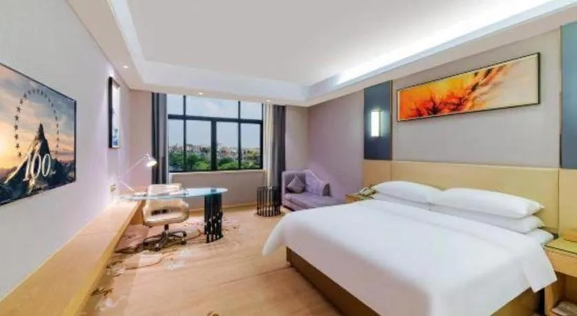 Bed in Vienna Hotel Guangdong Zhongshan Xiaolan High-Speed Railway Station