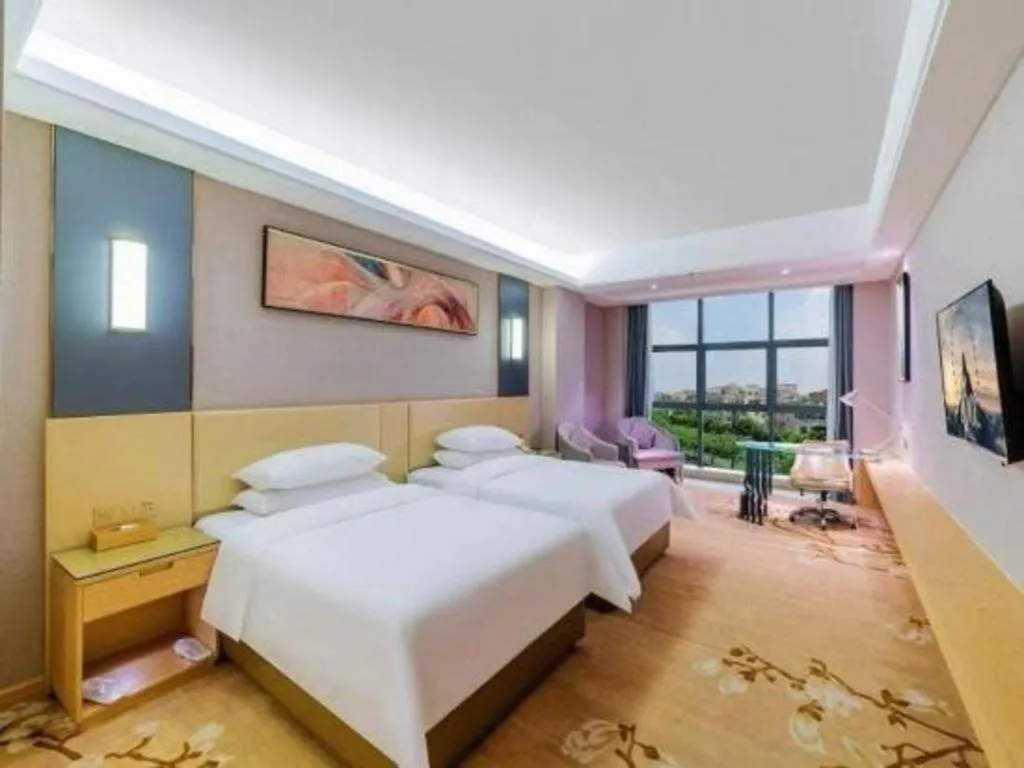 Bed in Vienna Hotel Guangdong Zhongshan Xiaolan High-Speed Railway Station