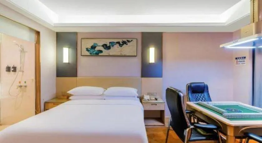 Bed in Vienna Hotel Guangdong Zhongshan Xiaolan High-Speed Railway Station