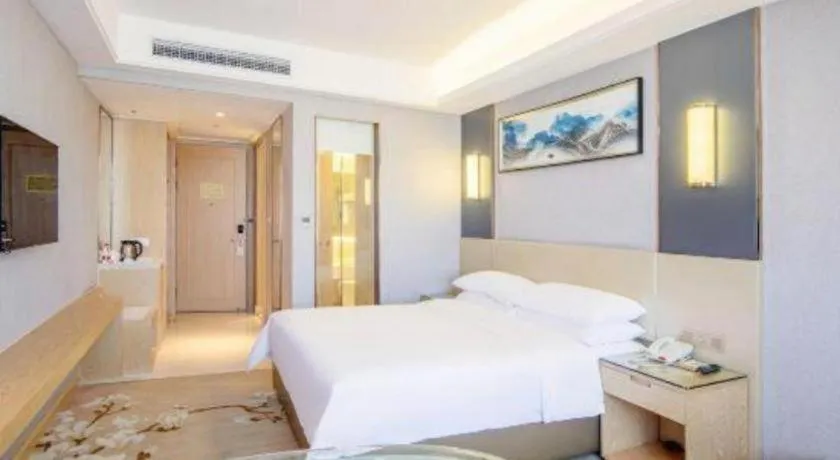 Bed in Vienna Hotel Guangdong Zhongshan Xiaolan High-Speed Railway Station