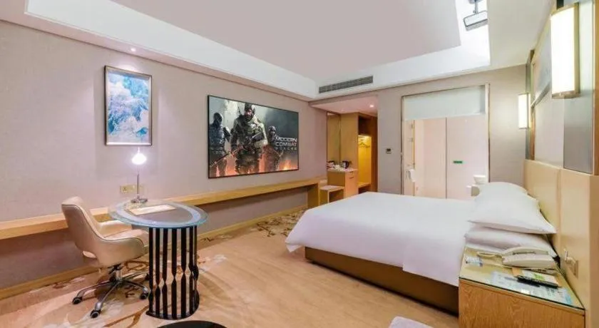 Bed in Vienna Hotel Guangdong Zhongshan Xiaolan High-Speed Railway Station