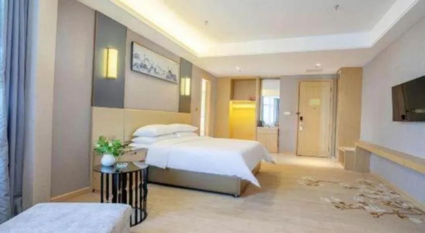 Bed in Vienna Hotel Guangdong Zhongshan Xiaolan High-Speed Railway Station