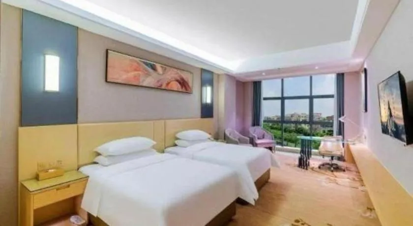 Bed in Vienna Hotel Guangdong Zhongshan Xiaolan High-Speed Railway Station