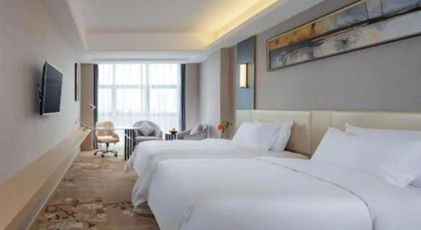 Bed in Vienna Hotel Guangdong Zhongshan Xiaolan High-Speed Railway Station