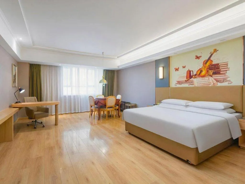Bed in Vienna Hotel Xuzhou Junsheng Plaza Benteng Avenue Metro Station