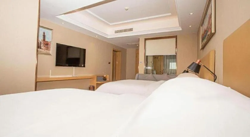 Bed in Vienna Hotel Xuzhou Junsheng Plaza Benteng Avenue Metro Station