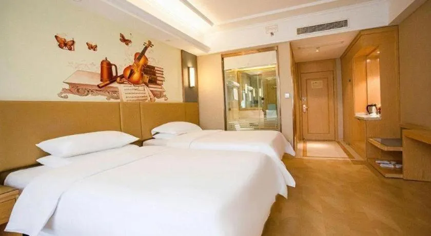 Bed in Vienna Hotel Xuzhou Junsheng Plaza Benteng Avenue Metro Station