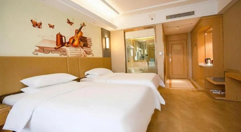 Bed in Vienna Hotel Xuzhou Junsheng Plaza Benteng Avenue Metro Station