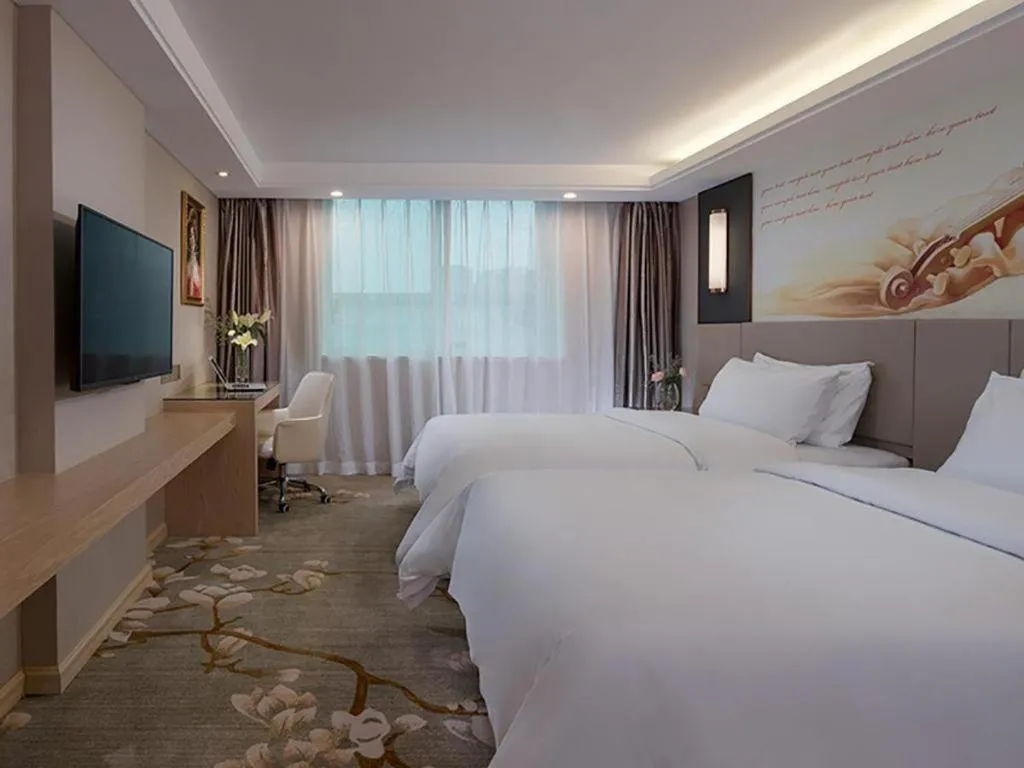 Bed in Venus International Hotel Guangdong Huizhou West Lake
