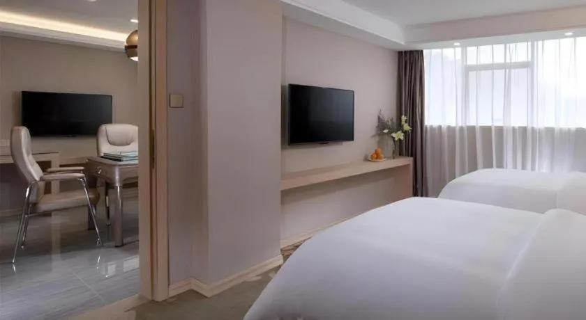 Bed in Venus International Hotel Guangdong Huizhou West Lake
