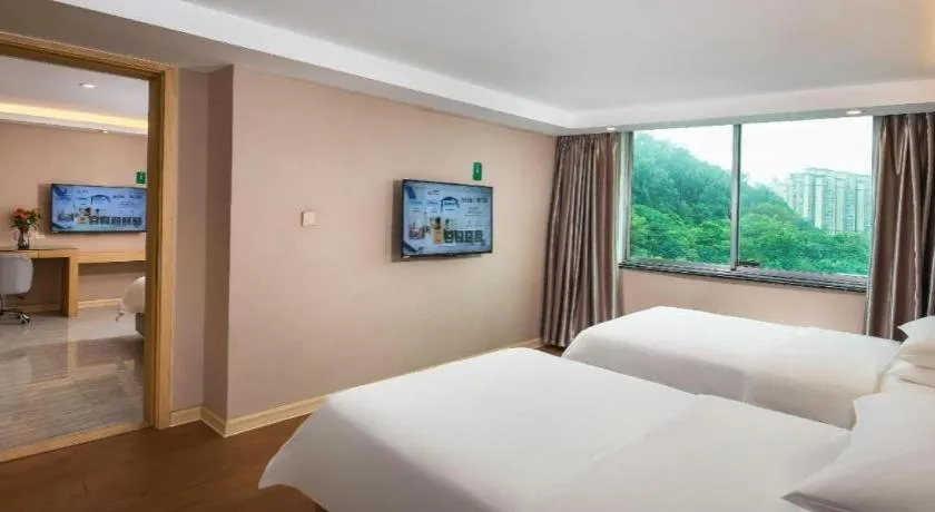 Bed in Venus International Hotel Guangdong Huizhou West Lake