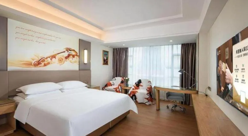 Bed in Venus International Hotel Guangdong Huizhou West Lake