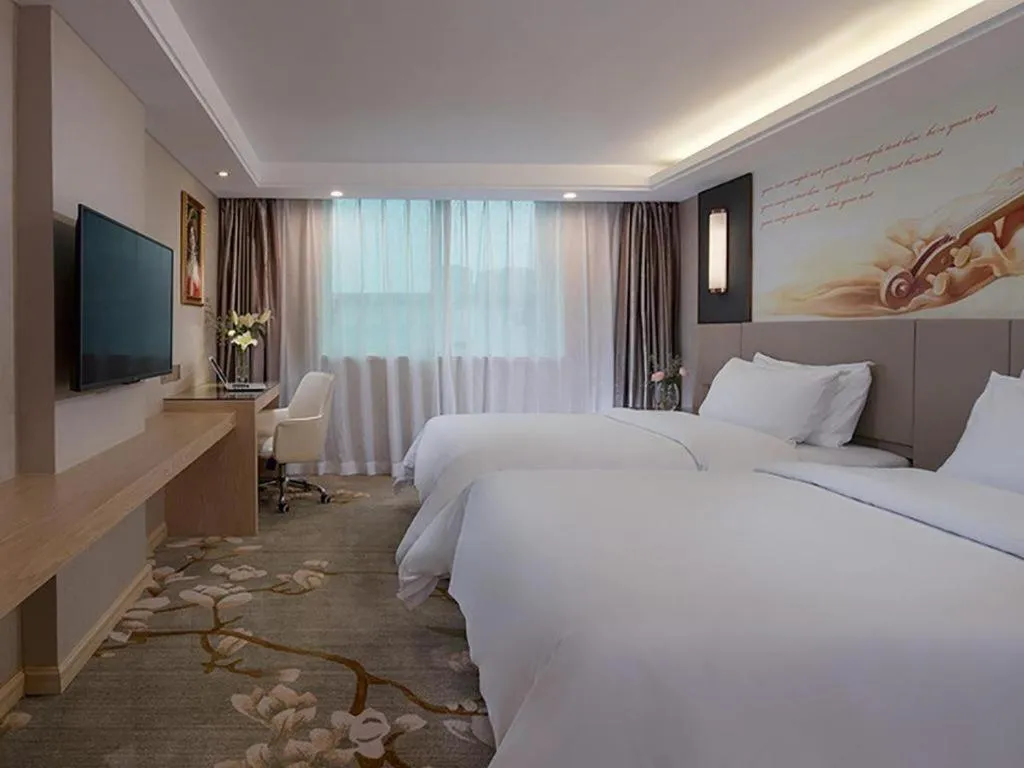 Bed in Venus International Hotel Guangdong Huizhou West Lake