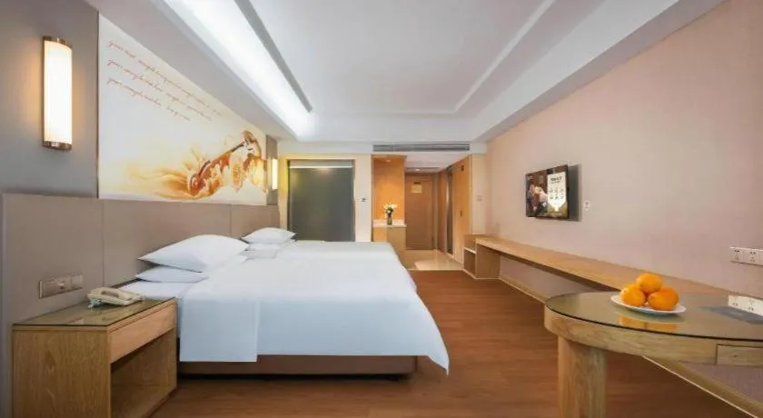 Bed in Venus International Hotel Guangdong Huizhou West Lake