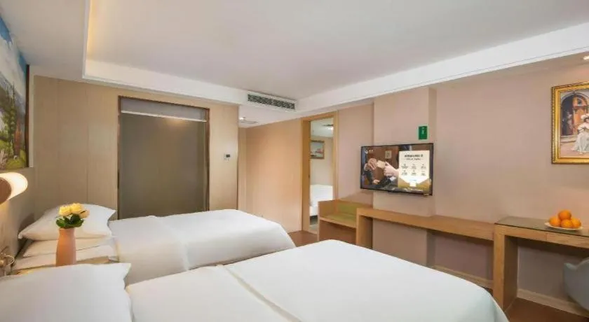 Bed in Venus International Hotel Guangdong Huizhou West Lake