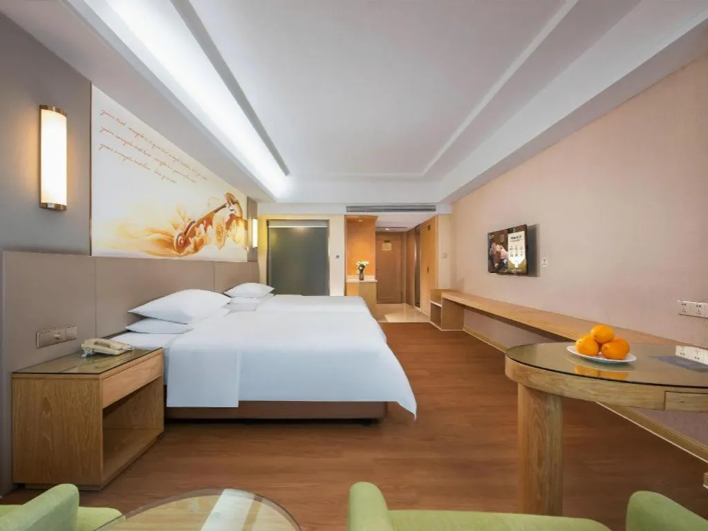 Bed in Venus International Hotel Guangdong Huizhou West Lake
