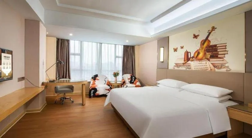 Bed in Venus International Hotel Guangdong Huizhou West Lake