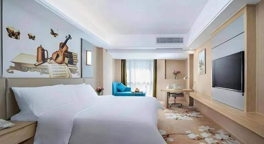 Bed in Vienna Hotel Fuzhou Changle Shouzhan Hangcheng Metro Station