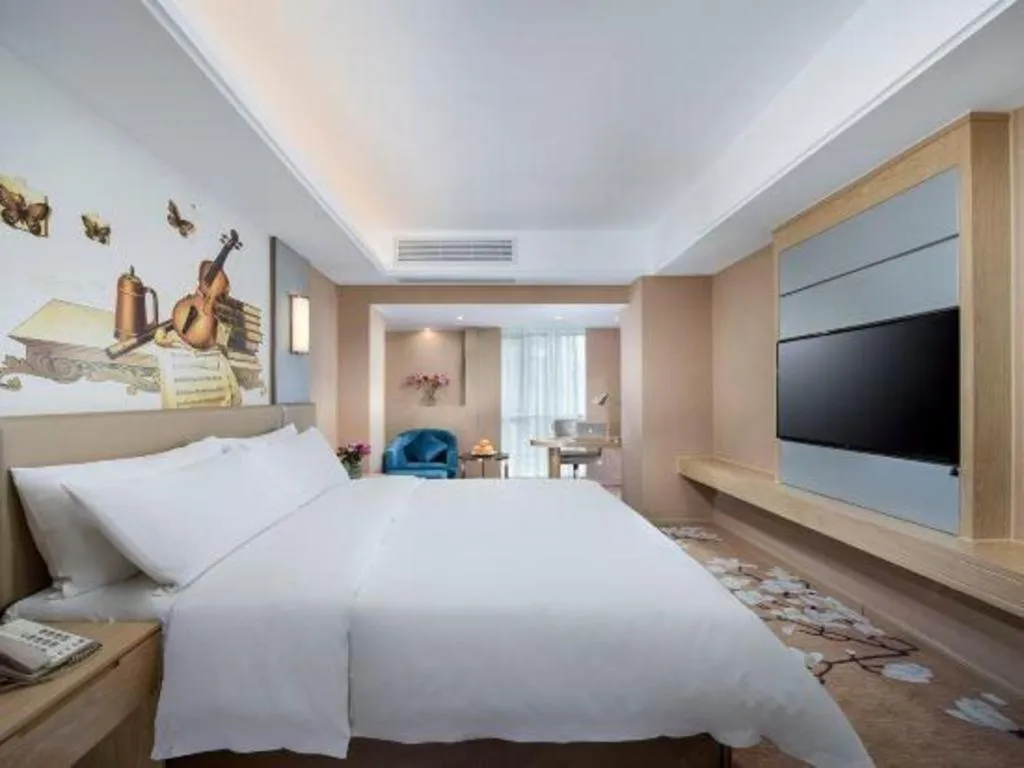 Bed in Vienna Hotel Fuzhou Changle Shouzhan Hangcheng Metro Station