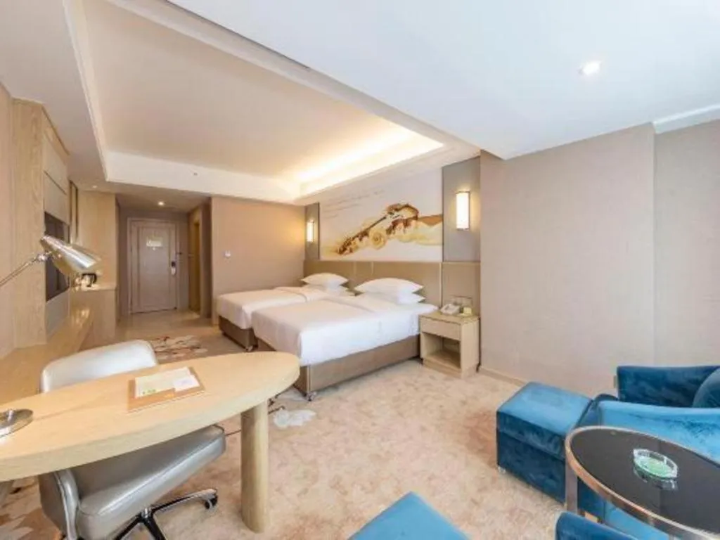 Bed in Vienna Hotel Fuzhou Changle Shouzhan Hangcheng Metro Station