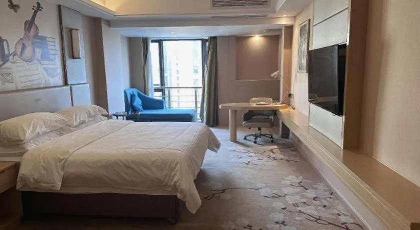 Bed in Vienna Hotel Fuzhou Changle Shouzhan Hangcheng Metro Station