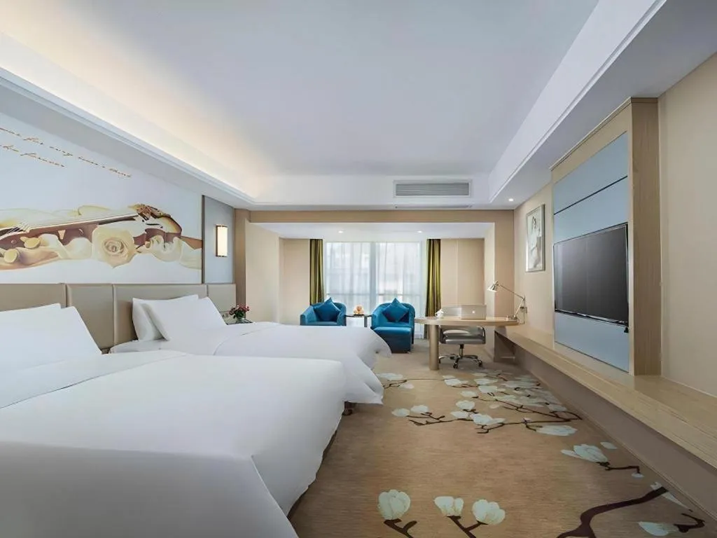 Bed in Vienna Hotel Fuzhou Changle Shouzhan Hangcheng Metro Station