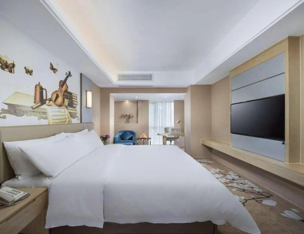 Bed in Vienna Hotel Fuzhou Changle Shouzhan Hangcheng Metro Station