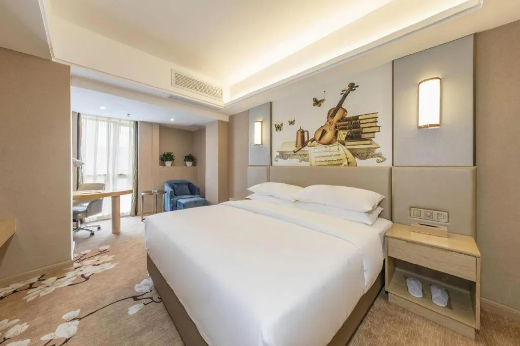 Bed in Vienna Hotel Fuzhou Changle Shouzhan Hangcheng Metro Station